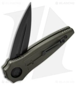 Paragon Warlock Knife OD Green Aluminum Cross/Shield/Sword (3.9" Black) 6 Paragon Warlock Knife OD Green Aluminum Cross/Shield/Sword (3.9" Black) -Elite Folds paragon warlok odg c s s cb half cm